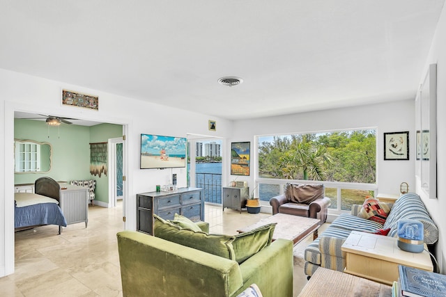 711 NE Harbour Ter Unit 4120, Boca Raton, FL 33431 - living room with healthy amount of natural light and ceiling fan
