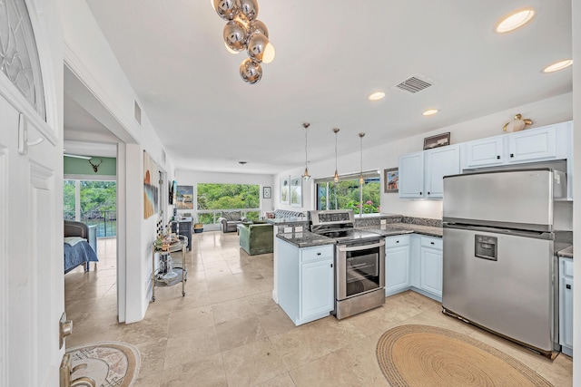 711 NE Harbour Ter Unit 4120, Boca Raton, FL 33431 - kitchen with stainless steel appliances, a peninsula, open floor plan, healthy amount of natural light, and recessed lighting