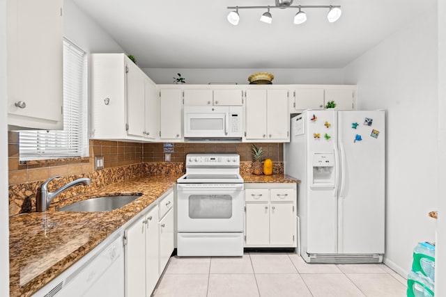 2538 Boundbrook Dr S Unit 140, West Palm Beach, FL 33406 - kitchen with white appliances, a sink, white cabinetry, backsplash, and light tile patterned floors