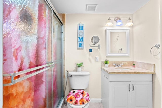 2538 Boundbrook Dr S Unit 140, West Palm Beach, FL 33406 - full bath with a stall shower, toilet, vanity, baseboards, and tile patterned floors