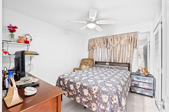 2538 Boundbrook Dr S Unit 140, West Palm Beach, FL 33406 - tiled bedroom featuring a ceiling fan