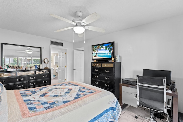 2538 Boundbrook Dr S Unit 140, West Palm Beach, FL 33406 - bedroom with a ceiling fan, a desk, and light tile patterned flooring