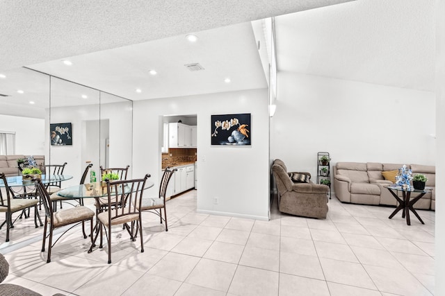 2538 Boundbrook Dr S Unit 140, West Palm Beach, FL 33406 - dining room with light tile patterned flooring and recessed lighting