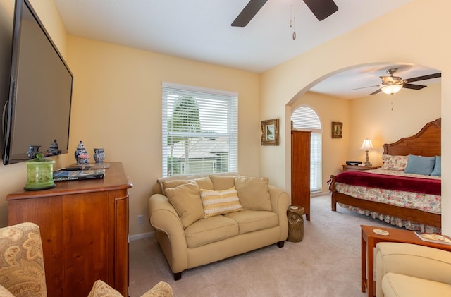 7897 Monarch Ct, Delray Beach, FL 33446 - bedroom featuring light colored carpet, arched walkways, and a ceiling fan