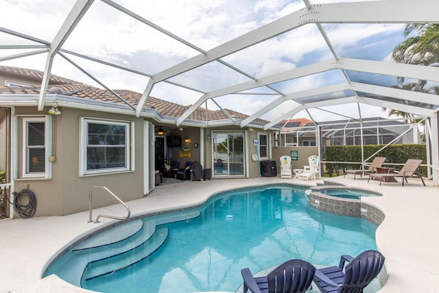 7897 Monarch Ct, Delray Beach, FL 33446 - view of pool with a patio area, a pool with connected hot tub, and a lanai