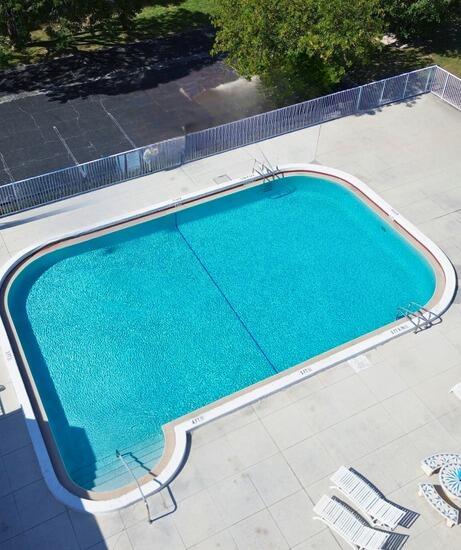3790 Silver Lace Ln, Boynton Beach, FL 33436 - community pool with a patio