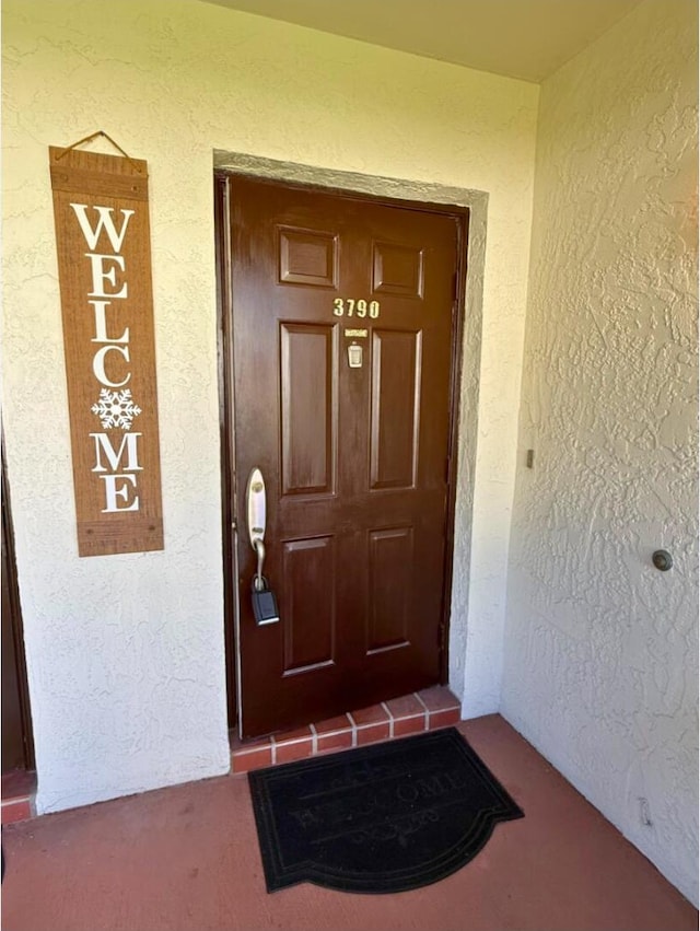 3790 Silver Lace Ln, Boynton Beach, FL 33436 - property entrance featuring stucco siding