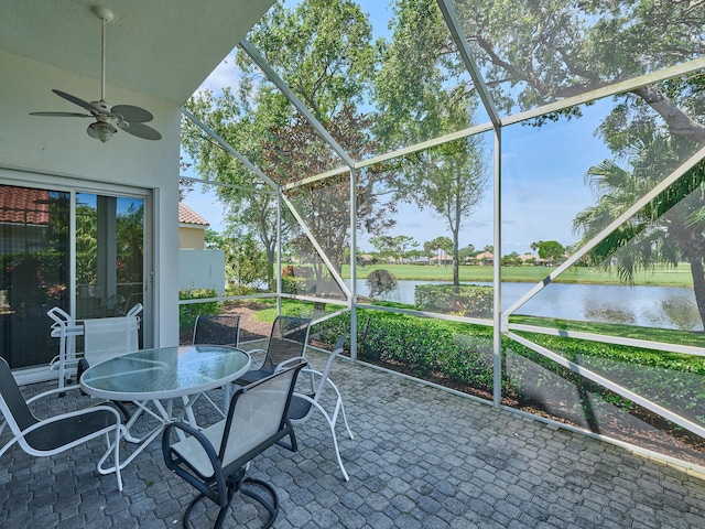 5455 S Fountains Dr S, Lake Worth, FL 33467 - sunroom featuring a ceiling fan, a water view, and outdoor dining area