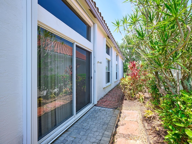 5455 S Fountains Dr S, Lake Worth, FL 33467 - view of side of property featuring stucco siding