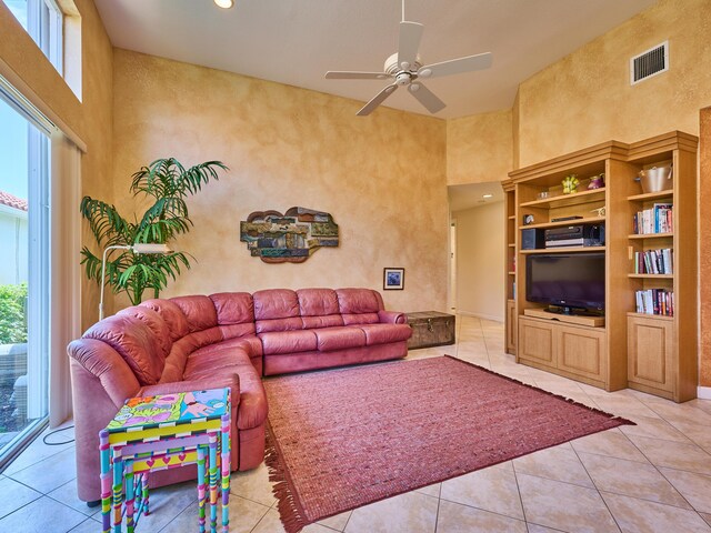 5455 S Fountains Dr S, Lake Worth, FL 33467 - living area with plenty of natural light, a towering ceiling, a ceiling fan, light tile patterned floors, and recessed lighting