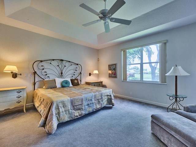 5455 S Fountains Dr S, Lake Worth, FL 33467 - bedroom with carpet flooring, a tray ceiling, baseboards, and ceiling fan