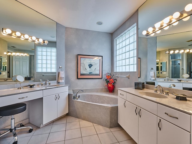 5455 S Fountains Dr S, Lake Worth, FL 33467 - full bath featuring healthy amount of natural light, a bath, tile patterned flooring, and two vanities