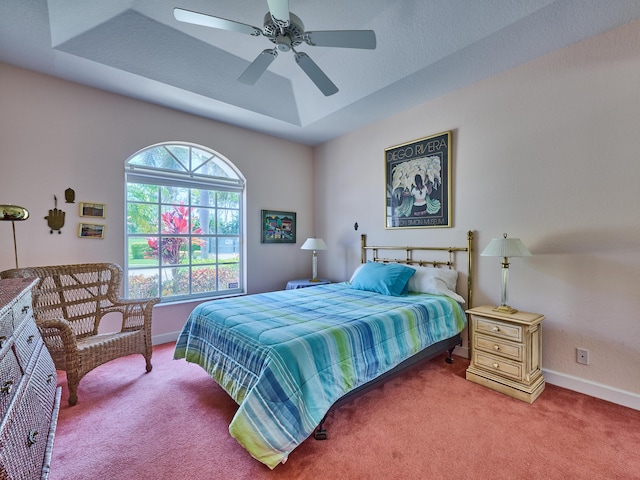 5455 S Fountains Dr S, Lake Worth, FL 33467 - bedroom featuring carpet flooring, a tray ceiling, baseboards, and ceiling fan