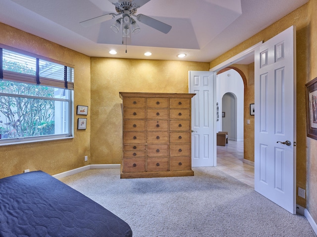 5455 S Fountains Dr S, Lake Worth, FL 33467 - carpeted bedroom with arched walkways, baseboards, a textured wall, recessed lighting, and ceiling fan
