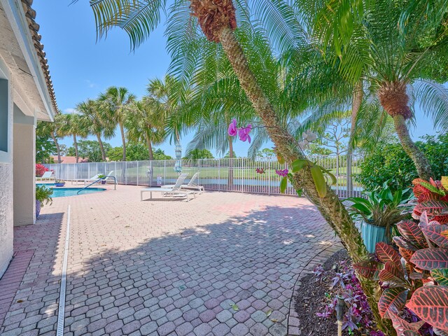5455 S Fountains Dr S, Lake Worth, FL 33467 - view of patio featuring fence