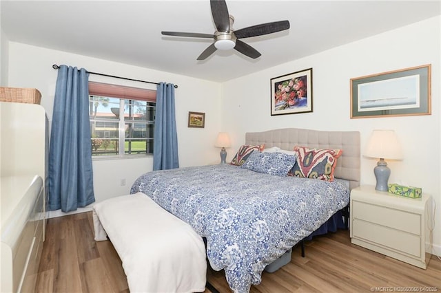 1925 SW Palm City Rd Unit C, Stuart, FL 34994 - bedroom with wood finished floors and ceiling fan