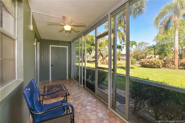 1925 SW Palm City Rd Unit C, Stuart, FL 34994 - unfurnished sunroom with a ceiling fan
