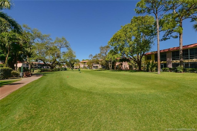1925 SW Palm City Rd Unit C, Stuart, FL 34994 - view of home's community with a lawn
