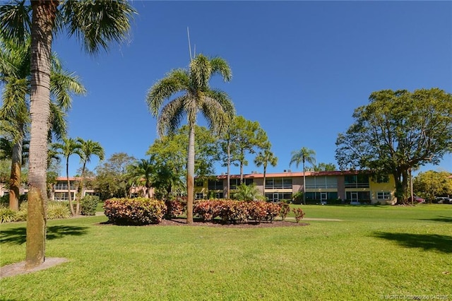 1925 SW Palm City Rd Unit C, Stuart, FL 34994 - view of property's community with a lawn
