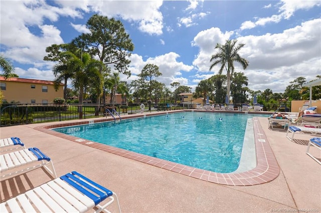 1925 SW Palm City Rd Unit C, Stuart, FL 34994 - community pool featuring fence and a patio