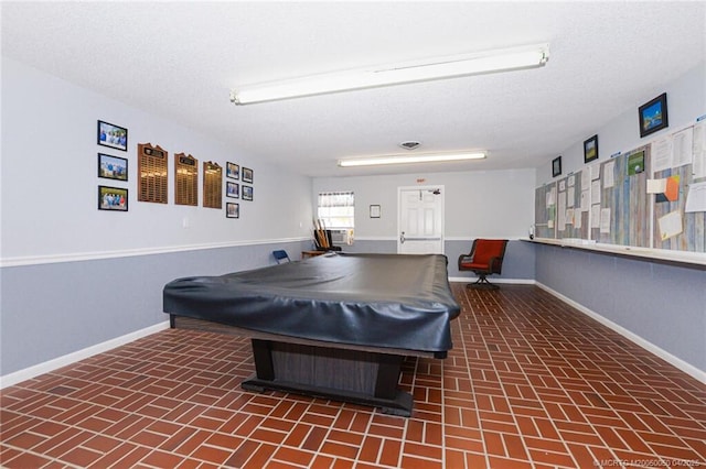 1925 SW Palm City Rd Unit C, Stuart, FL 34994 - rec room with brick patterned flooring, billiards, and baseboards