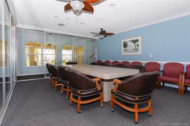 1925 SW Palm City Rd Unit C, Stuart, FL 34994 - carpeted dining room with a ceiling fan, crown molding, a textured ceiling, and wainscoting
