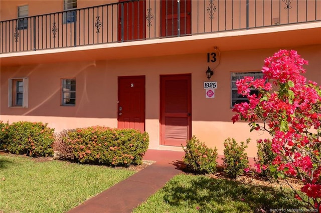 1925 SW Palm City Rd Unit C, Stuart, FL 34994 - property entrance featuring stucco siding