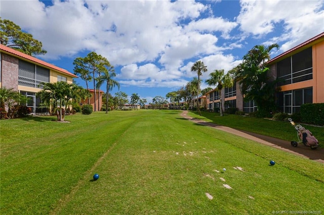 1925 SW Palm City Rd Unit C, Stuart, FL 34994 - view of home's community with a lawn