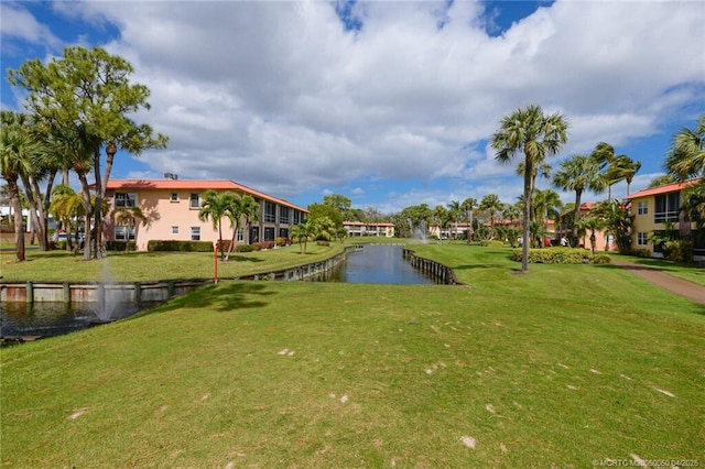 1925 SW Palm City Rd Unit C, Stuart, FL 34994 - view of property's community featuring a water view and a lawn