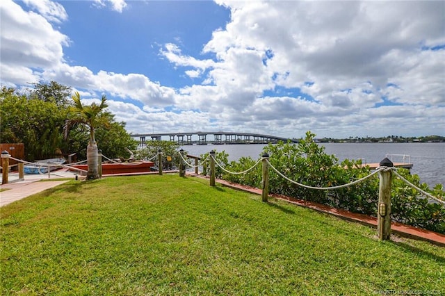 1925 SW Palm City Rd Unit C, Stuart, FL 34994 - view of grassy yard featuring a water view