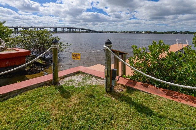 1925 SW Palm City Rd Unit C, Stuart, FL 34994 - dock featuring a water view