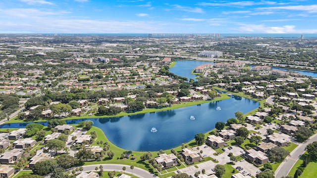 aerial view of residential area with a nearby body of water