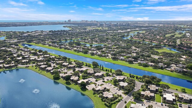 aerial perspective of suburban area with a large body of water