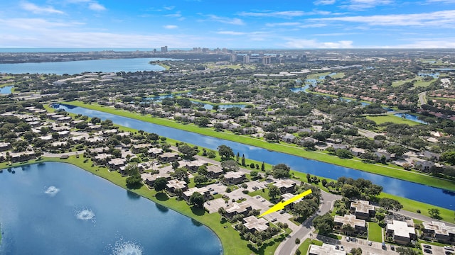 aerial perspective of suburban area with a large body of water