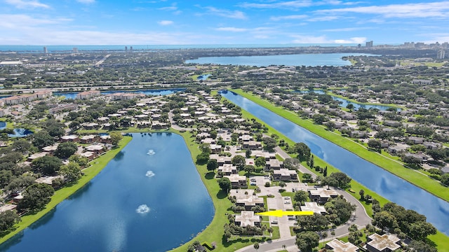 aerial view of residential area with a nearby body of water