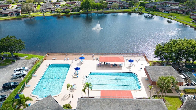 bird's eye view of a pool and a large body of water