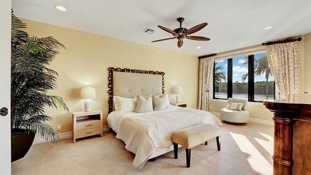 bedroom with light carpet, baseboards, recessed lighting, and a ceiling fan