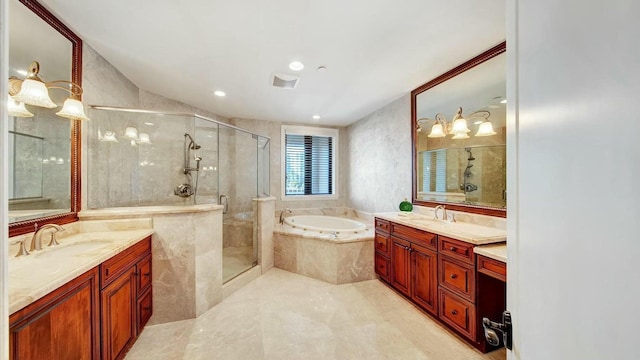 bathroom with a shower stall, a garden tub, two vanities, tile patterned floors, and recessed lighting