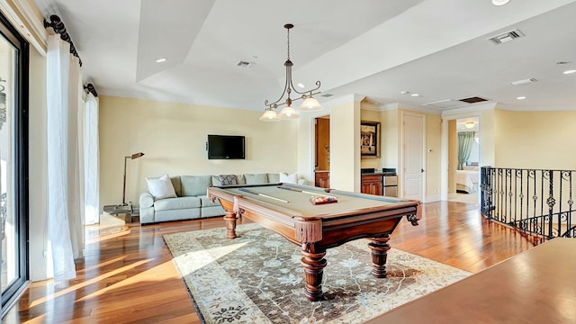 rec room with light wood finished floors, ornamental molding, recessed lighting, billiards, and baseboards