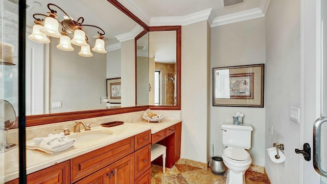 bathroom featuring a chandelier, ornamental molding, vanity, baseboards, and toilet
