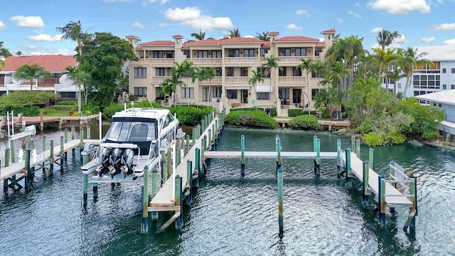 dock with a water view and boat lift