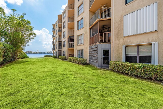 896 N Federal Hwy Unit 121, Lantana, FL 33462 - view of apartment building / complex featuring a water view