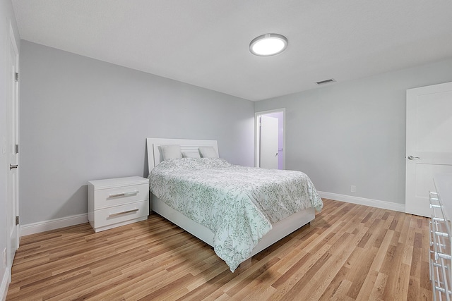 3839 Coco Loba Ln, Boynton Beach, FL 33436 - bedroom featuring baseboards and light wood finished floors