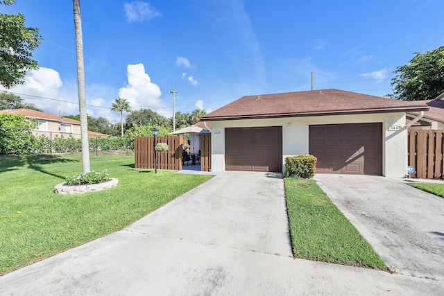 3839 Coco Loba Ln, Boynton Beach, FL 33436 - view of front facade featuring stucco siding, a shingled roof, and a garage