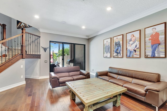 8979 Little Falls Way, Delray Beach, FL 33446 - living area featuring stairs, hardwood / wood-style flooring, a textured ceiling, baseboards, and ornamental molding