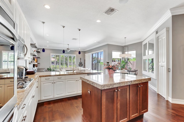 8979 Little Falls Way, Delray Beach, FL 33446 - kitchen with a sink, ceiling fan, dark wood-type flooring, recessed lighting, and a peninsula