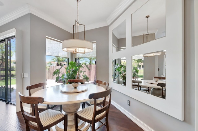 8979 Little Falls Way, Delray Beach, FL 33446 - dining space featuring plenty of natural light, dark wood-style floors, crown molding, and baseboards