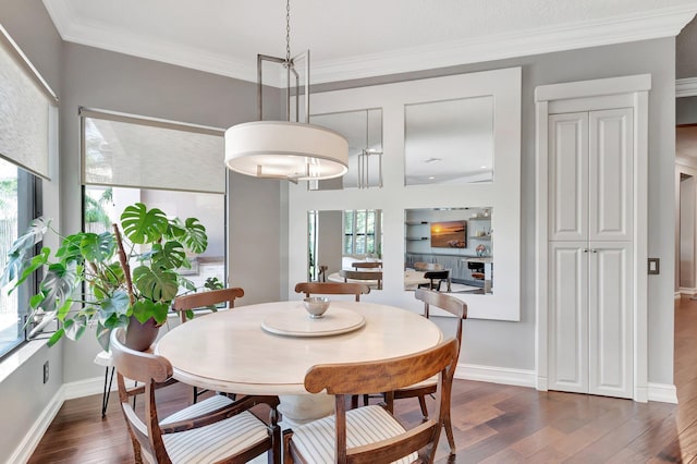 8979 Little Falls Way, Delray Beach, FL 33446 - dining area featuring dark wood-style floors, crown molding, and baseboards