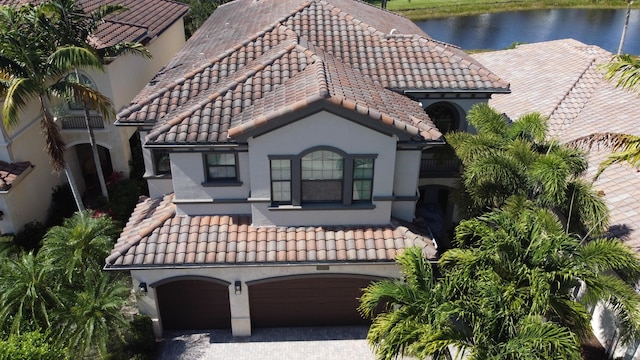 view of subject property featuring a nearby body of water
