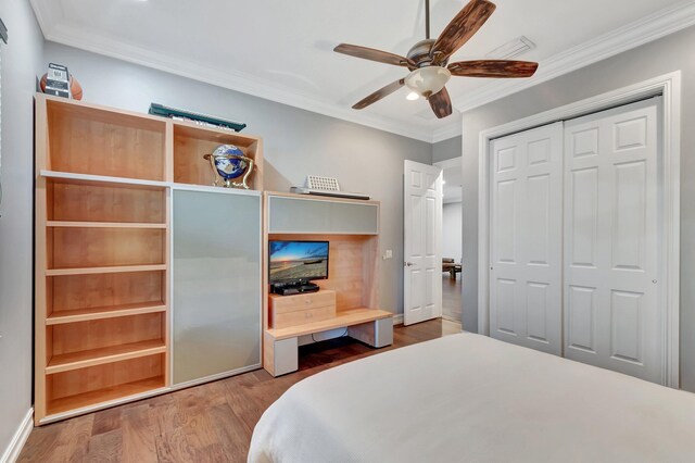 8979 Little Falls Way, Delray Beach, FL 33446 - bedroom with crown molding, wood finished floors, a closet, ceiling fan, and baseboards